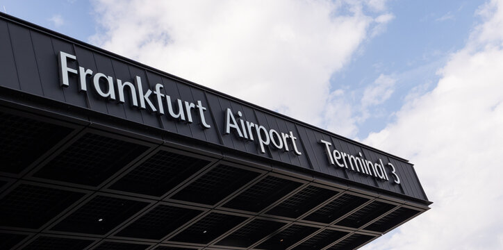 Airport Frankfurt am Main, Germany, April 11, 2026. - Frankfurt International Airport Terminal 3. View to the edge of the building&rsquo;s roof.  Sky with clouds in the background.