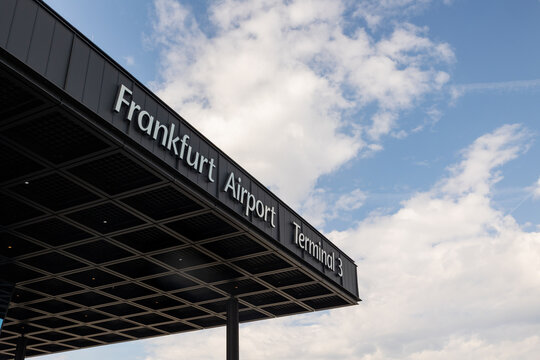 Airport Frankfurt am Main, Germany, April 11, 2026. - Frankfurt International Airport Terminal 3. View to the edge of the building&rsquo;s roof.  Sky with clouds in the background.
