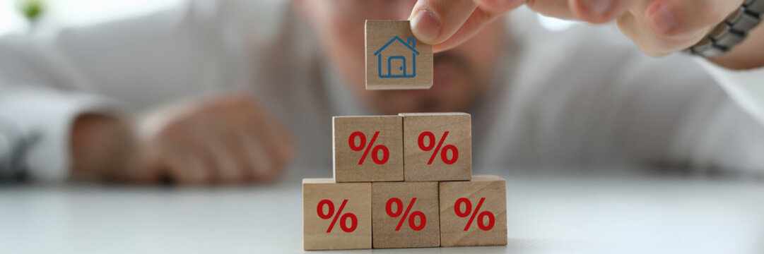 Property rates and real estate interest, interest rates, inflation, mortgage loans, tax increases. Increasing interest rates concept.