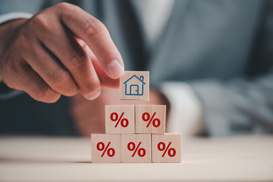 Property rates and real estate interest, interest rates, inflation, mortgage loans, tax increases. Increasing interest rates concept.