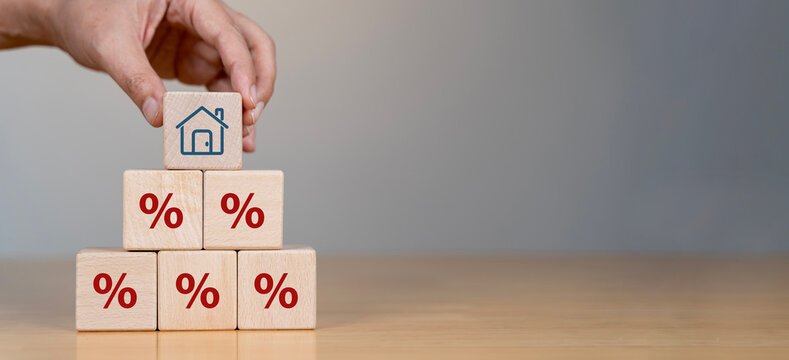 Property rates and real estate interest, interest rates, inflation, mortgage loans, tax increases. Increasing interest rates concept.