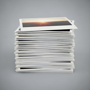 A towering stack of newspapers with a sunset on the top page