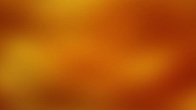 Amber and dark orange gradient loop with soft moving waves. Abstract holographic effect creates a warm modern texture. Perfect for futuristic intro, outro