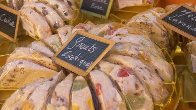 Assorted handmade nougat candy on display