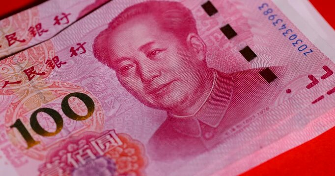 the number 100 on a red yuan folded together, a large amount of money is the Chinese national currency