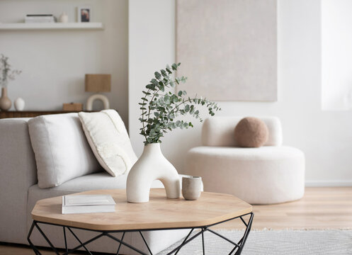 Modern scandinavian style interior with chair and trendy vase, Home staging and minimalism concept. Minimal Scandi interior.