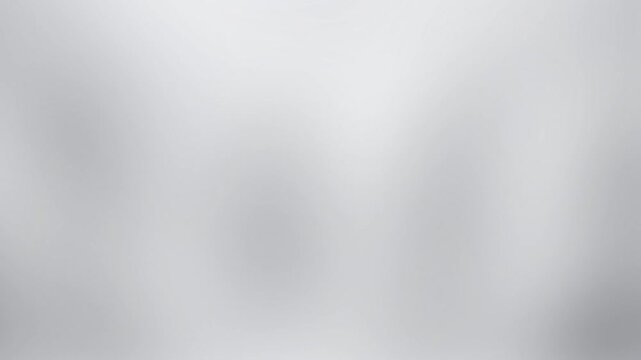 Grey and silver gradient loop with soft moving waves. Abstract holographic light effect creates a clean modern texture. Perfect for futuristic intro, outro, or wallpaper background