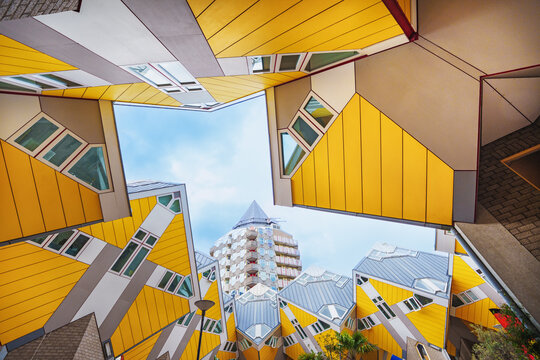 Spectacular Urban Landscape, Vibrant Yellow Cube Houses in Rotterdam, a Modern Architectural Marvel and Tourist Attraction in the Netherlands