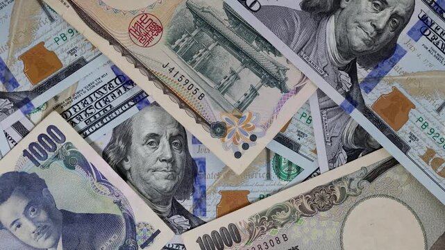 International currency mix with US dollars and Japanese yen rotating
