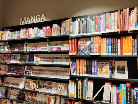 Rome, Italy - September 20, 2025, a bookstore shelf filled with Japanese comics, or manga, a sequential art form characterized by a distinctive style.