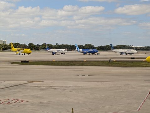 JetBlue and Spirit Airlines, the major carriers serving South Florida&rsquo;s Fort Lauderdale-Hollywood International Airport, parked outside the terminals.  