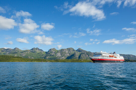 Hurtigruten's MS Finnmarken approaching the narrowest fjord in Norway, Trollfjord