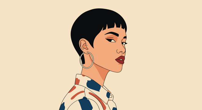 Stylish portrait of a young woman with a short black pixie haircut and large silver hoop earrings wearing a patterned shirt.