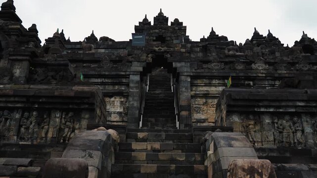 Cinematic footage of the iconic Borobudur Temple in Indonesia. Majestic stone stupas, ancient carvings, and serene atmosphere create a powerful spiritual and cultural scene.