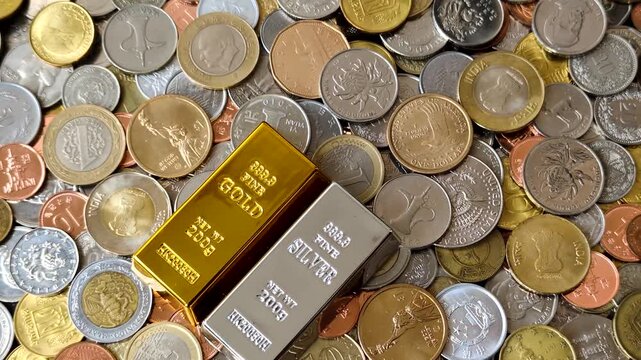 Gold and silver bullion or ingots as metals for bank storage, investments, and financial transactions. Gold and silver bars as a backdrop for your design