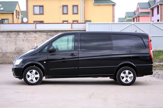 Vinnytsia, Ukraine; April 11, 2026. Black passenger Van Mercedes-Benz Vito Viano at city street. Modern Family Van Mercedes-Benz Vito at parking. Side left view.