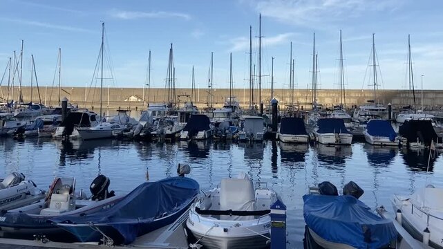 View of seaport and yacht marina by Garachico town on the northern coast of Tenerife, Canary Islands,Spain, 4K.