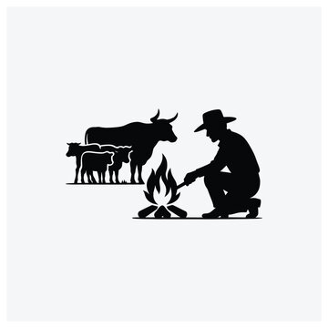Silhouette of a herder beside a campfire with cattle and sheep