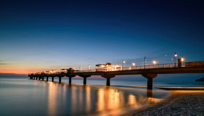 Fototapeta premium Miedzyzdroje Pier After Sunset on the Baltic Sea Coast