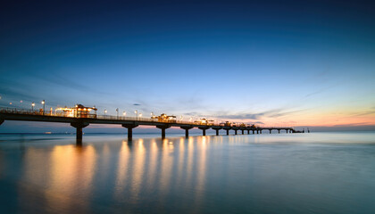 Fototapeta premium Miedzyzdroje Pier After Sunset on the Baltic Sea Coast