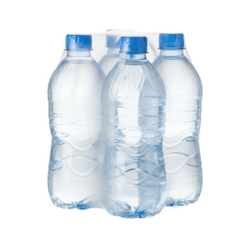 Four identical clear PET plastic water bottles, 500ml, with silver neck labels & blue caps, tightly shrink-wrapped, on a white studio surface with reflection, pristine clarity concept
