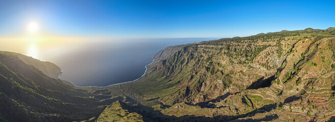 Aerial View of Eastern El Hierro Above the Clouds at Sunrise  Mirador de Isora Coastal Mist and Golden Hour Landscape  Volcanic Island Dawn Perspective © Mike Workman