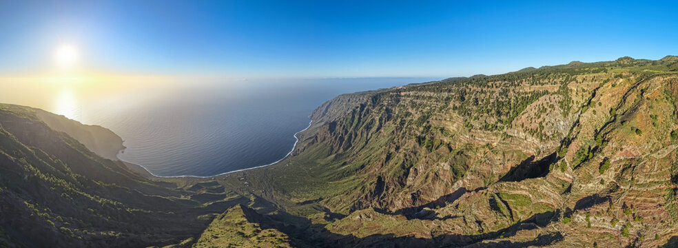 Aerial View of Eastern El Hierro Above the Clouds at Sunrise; Mirador de Isora Coastal Mist and Golden Hour Landscape; Volcanic Island Dawn Perspective