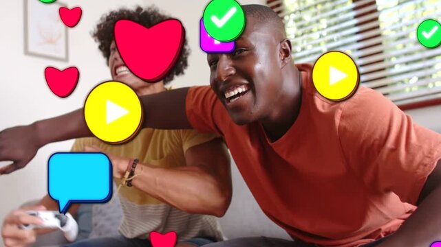 Two friends pressing controllers on sofa, reacting to gaming as bright social icons covering faces