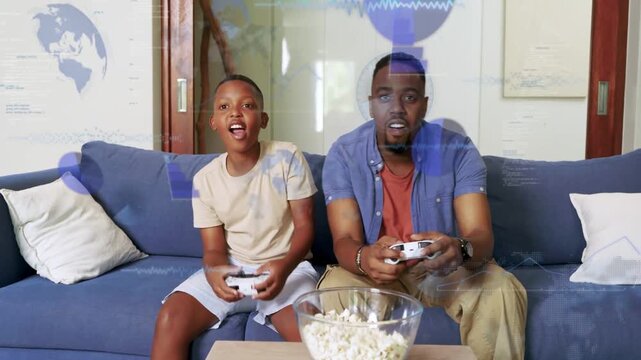 Dad and son gaming, game-triggered HUD overlays appearing, dad shielding son, holding controllers