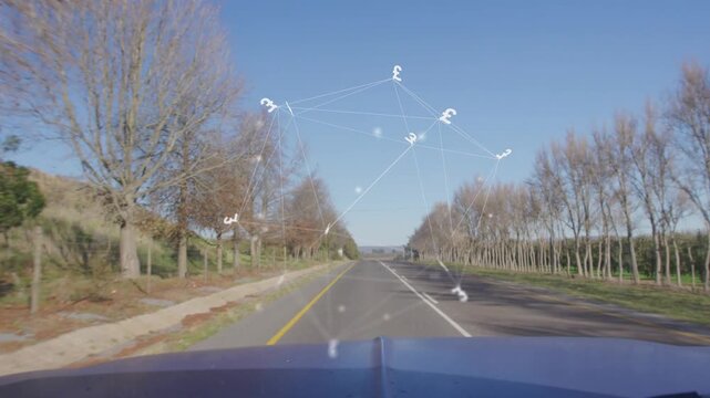 Dashcam recording rural road as engine starting and AR overlay nodes drifting above for driver aid