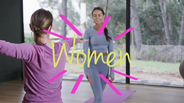 Coach in blue walking in fitness class, guiding T-pose, bumping fists, Women graphic over center