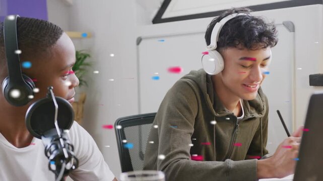 Vertical video: Seeing right smile left teen speaking to mic in study while other drawing for class