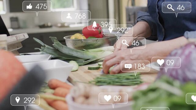 Senior cook placing board, slicing leek, lining beans, social icons rising over hands for cooking
