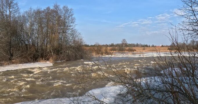 Spring snowmelt (also known as freshet) at Ruutinkoski rapids in spring, Helsinki, Finland, Europe.