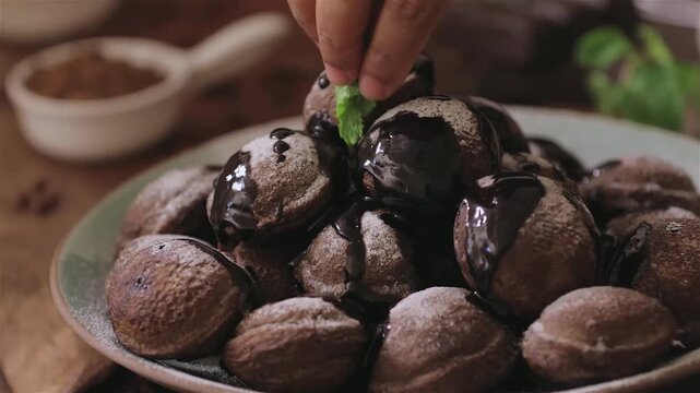 Chocolate Lava Cake mini dessert with molten chocolate flow served in closeup. Perfect chocolate, dessert and cake visuals with rich texture and indulgent presentation.