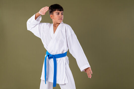 Shotokan karate rising block technique , age uke , showing proper arm position, balance, and defensive technique.