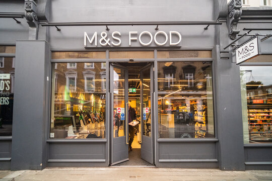 LONDON -  M&S Food convenience store and supermarket entrance on Queensway Bayswater