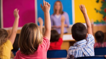Fototapeta premium Classroom scene with children raising hands while a teacher engages in learning activities