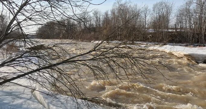 Spring snowmelt (also known as freshet) at Ruutinkoski rapids in spring, Helsinki, Finland, Europe.