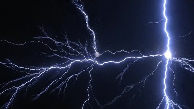 Electricity in the dark stormy night sky.