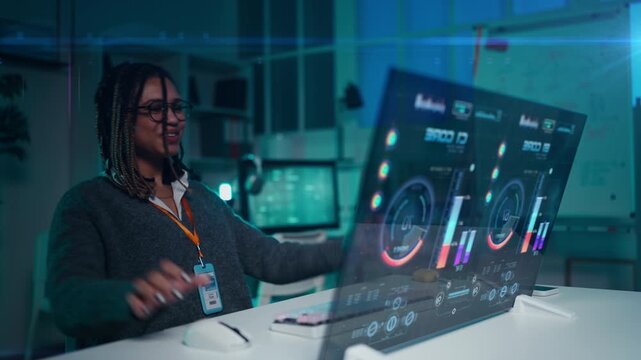 Woman IT engineer activates spacecraft engine on holographic control screen