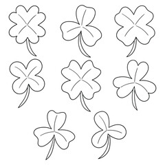 Fototapeta premium Hand-drawn doodle set of clovers on a white background.