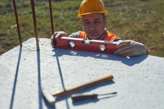 Construction worker working outdoors on a construction site.