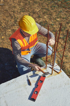 Construction worker working outdoors on a construction site.