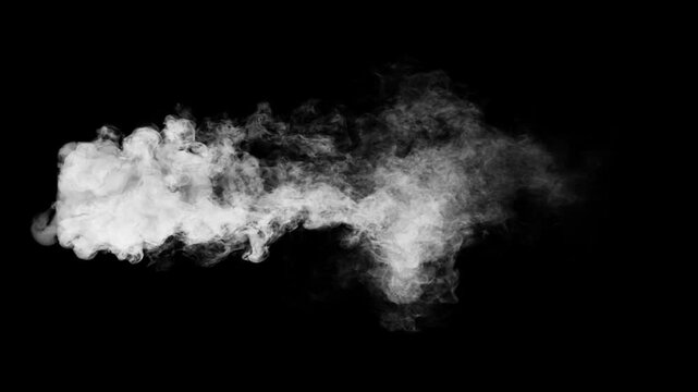 Drone view of White plume of smoke flow from the ground and staying down with strong side wind on a black background