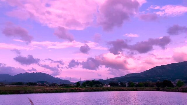 4K Timelapse of Multi‑Layer Clouds in Warm Tones Moving in Opposite Directions (No Audio)