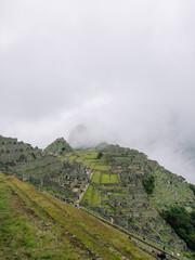Fototapeta premium Vertical View of Machu Picchu Terraces and Ruins