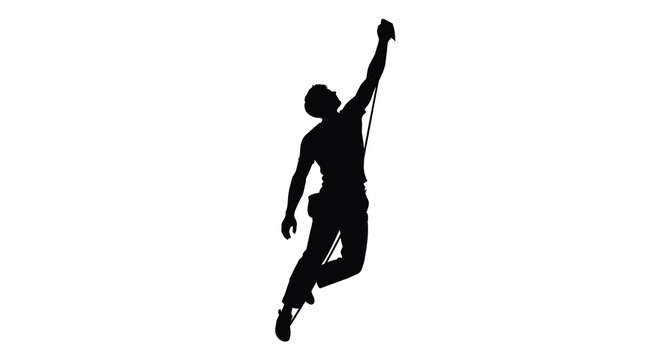 A rock climber reaching upwards with a rope captured in dark silhouette