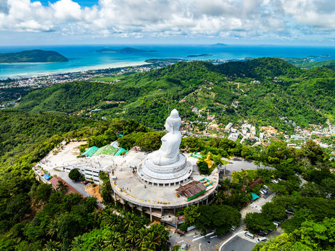 Aerial View drone shot of Big Buddha Statue on the high mountain at Phuket thailand