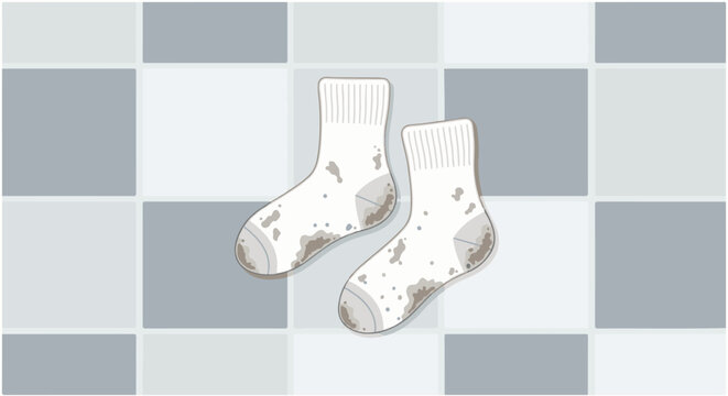 Two white socks, soiled with dirt and mud, rest on a checkered floor